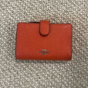 NEVER USED orange Coach wallet with built-in coin purse